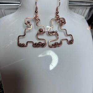 Copper puzzle piece earrings
